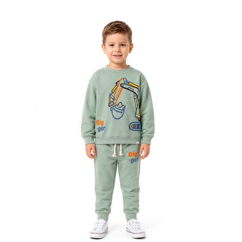 Toddler boy wearing an excavator print outfit 