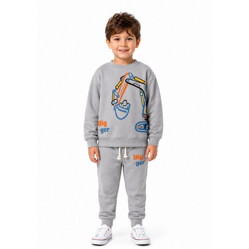 Toddler boy wearing an excavator print outfit 