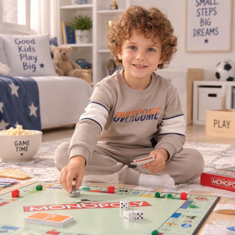 Young boy wearing a beige sweatshirt with Urban graphic print and matching jogger pants, a comfortable casual kids tracksuit set
