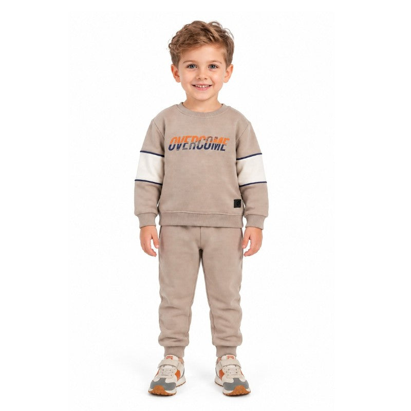 Young boy wearing a beige sweatshirt with Urban graphic print and matching jogger pants, a comfortable casual kids tracksuit set
