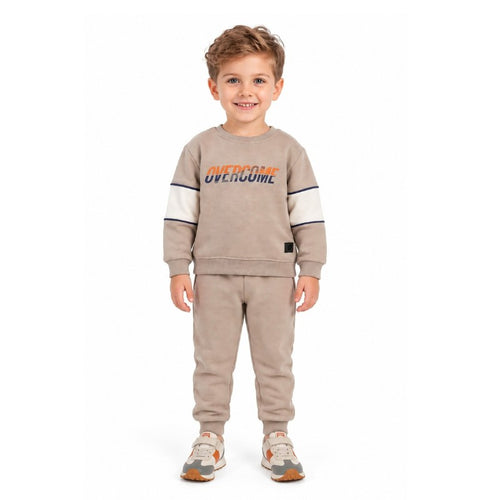 Young boy wearing a beige sweatshirt with Urban graphic print and matching jogger pants, a comfortable casual kids tracksuit set