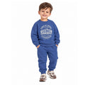 Young boy wearing a blue Boston graphic sweatshirt with matching jogger pants, a comfortable kids casual tracksuit for outdoor play