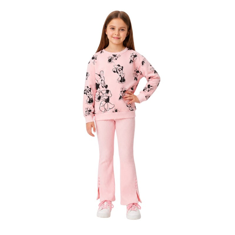 Young girl wearing a pink cartoon-print sweatshirt with matching ribbed flared pants