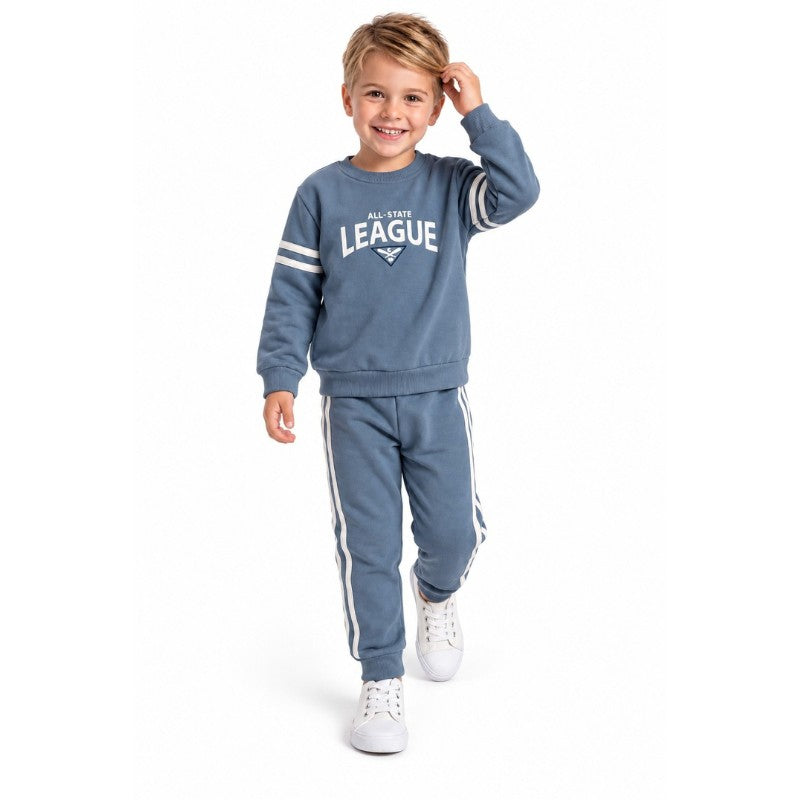 Young boy wearing a blue All-State League sweatshirt with matching striped jogger pants, stylish casual kids tracksuit