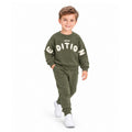 Boy wearing a  sweatshirt with Limited Edition graphic and matching jogger pants, stylish casual kids tracksuit