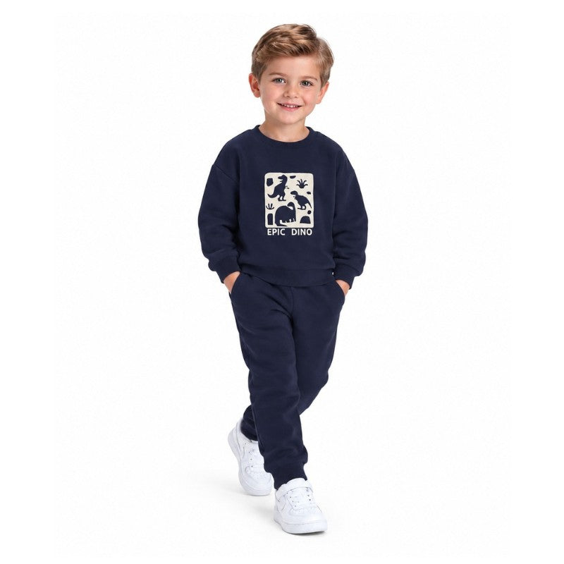 Young boy wearing a navy Epic Dino graphic sweatshirt with matching jogger pants, a stylish kids casual tracksuit set