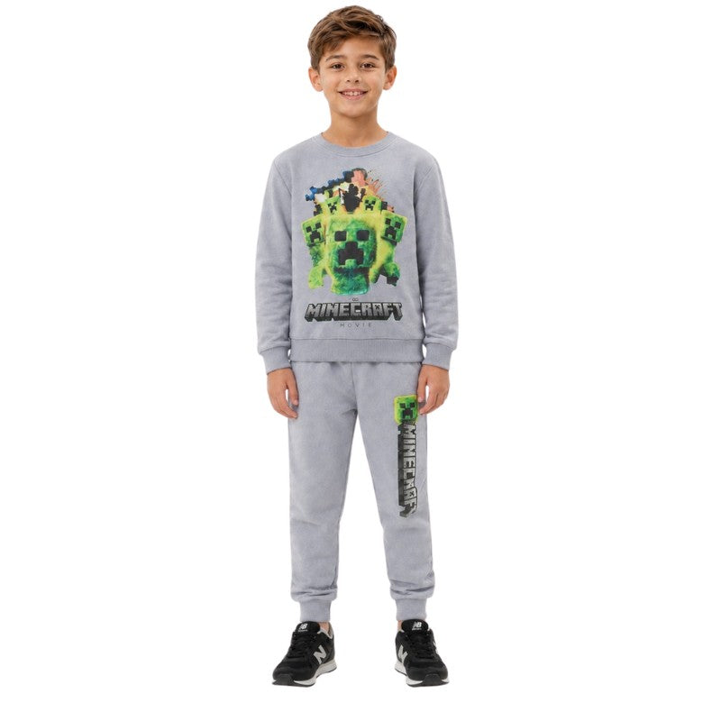 Boy wearing a grey Minecraft Creeper sweatshirt and matching jogger pants