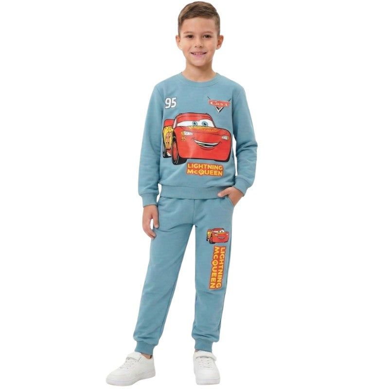Boy wearing a Lightning McQueen sweatshirt and matching jogger pants