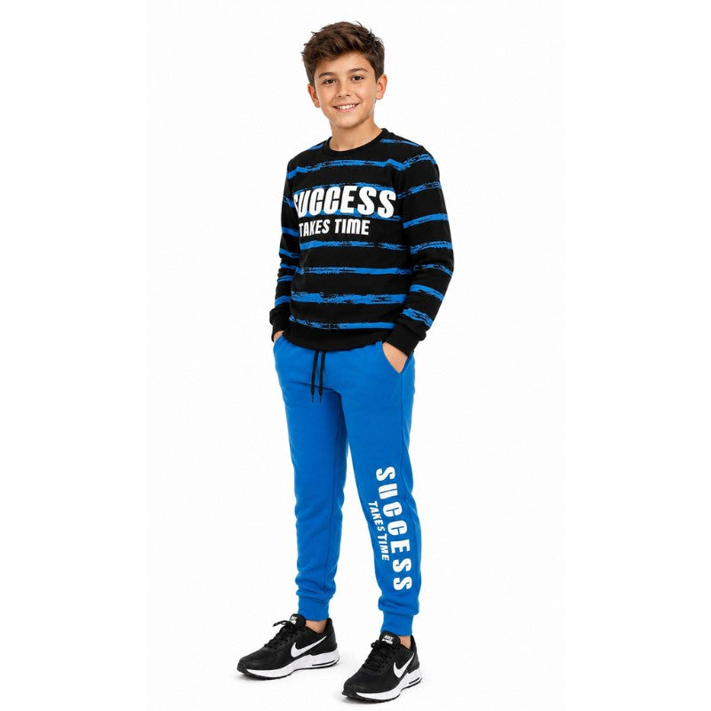 Boy wearing a black and blue Success graphic sweatshirt with matching blue jogger pants