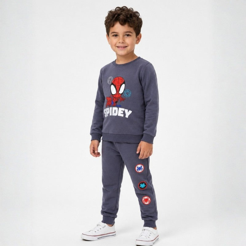 Young boy wearing a Spidey sweatshirt with matching jogger pants and white sneakers