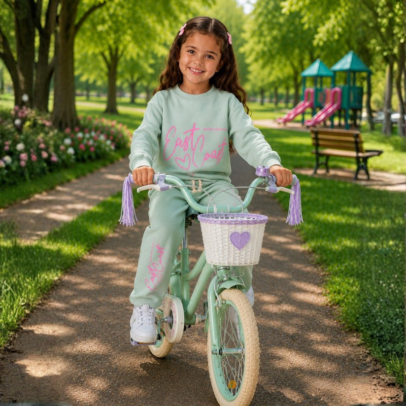 Young girl wearing a graphic tracksuit set 