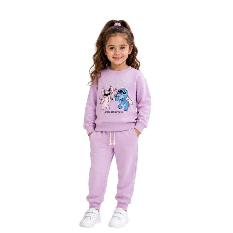 Young girl wearing a Stitch and Angel tracksuit 